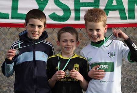 Action from the 2011 community games in Father Tierney Park.