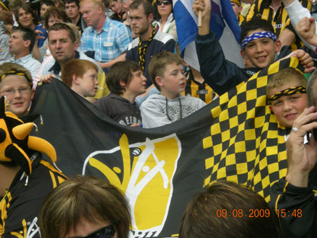 Our Aodh Ruadh hurlers supporting the Cats.