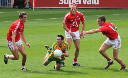 Action from the All-Ireland Senior Football Championship semi-final between Donegal and Cork.