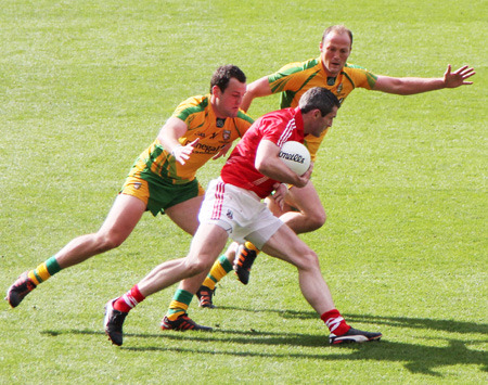 Action from the All-Ireland Senior Football Championship semi-final between Donegal and Cork.