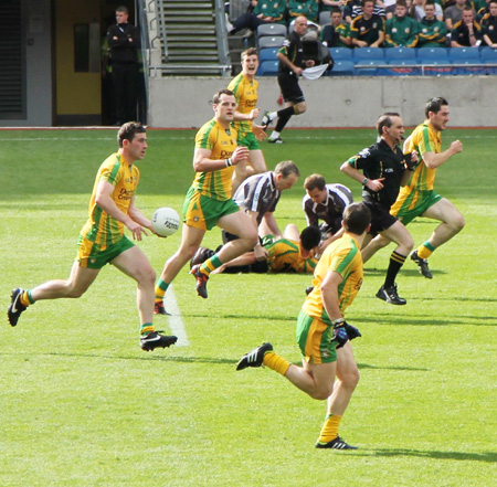 Action from the All-Ireland Senior Football Championship semi-final between Donegal and Cork.