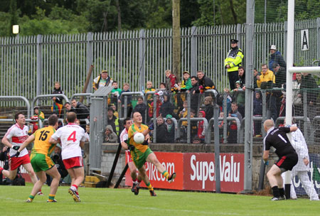 Action from the Ulster Senior Football Championship match between Donegal and Derry.