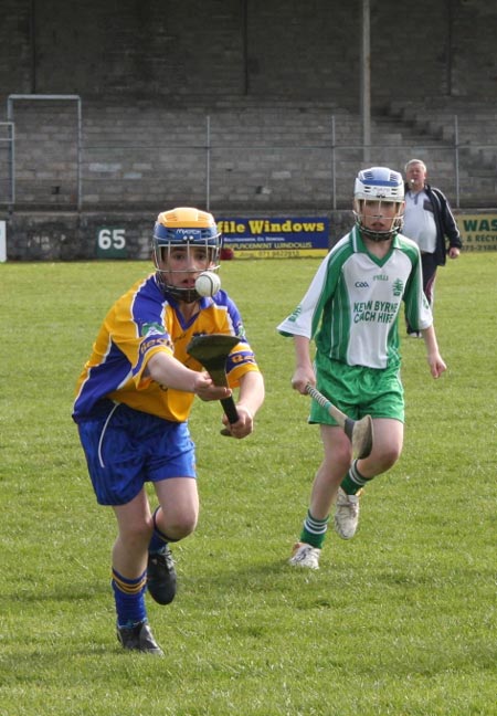 Action from the 2010 county Féile hurling finals.