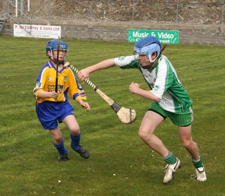 Action from the 2010 county Féile hurling finals.