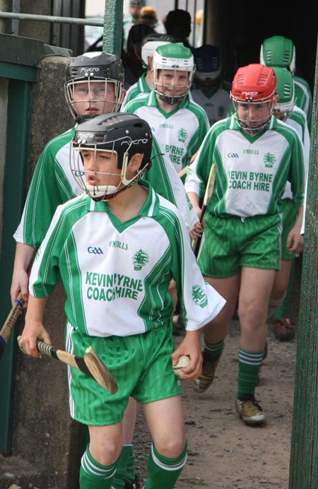 Action from the 2010 county Féile hurling finals.