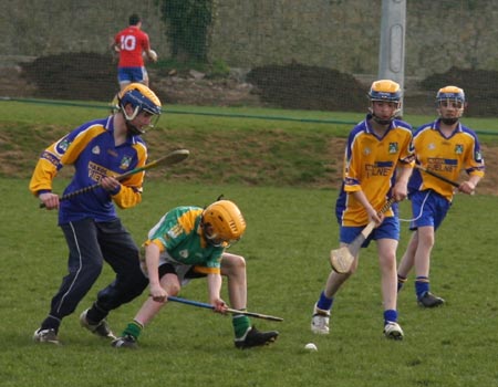 Action from the 2010 county Féile hurling finals.