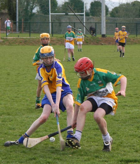 Action from the 2010 county Féile hurling finals.