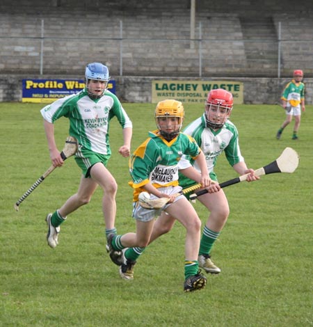 Action from the 2010 county Féile hurling finals.