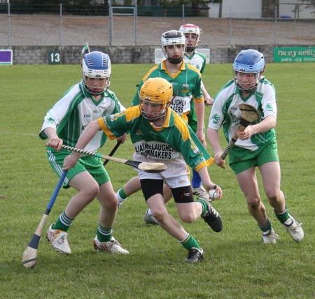 Action from the 2010 county Féile hurling finals.