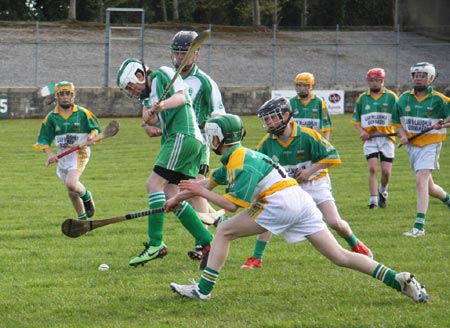 Action from the 2010 county Féile hurling finals.