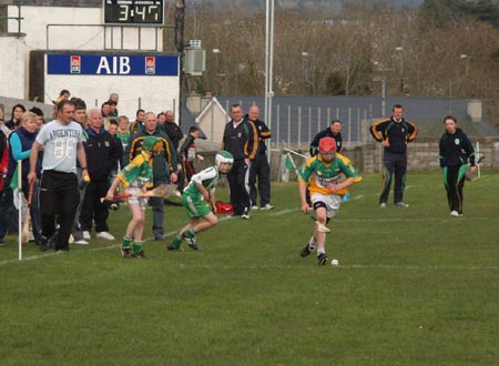 Action from the 2010 county Féile hurling finals.