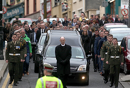 The funeral of John Larkin.