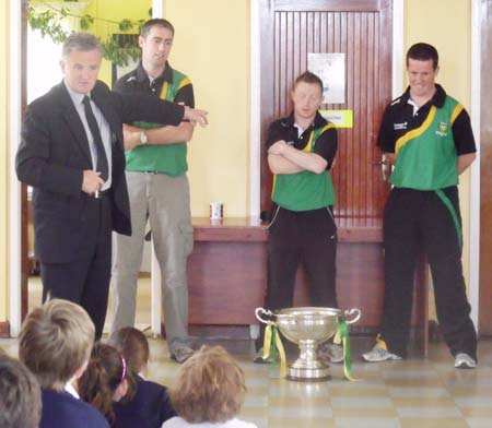 Conor Carney, Principal of Holy Family National School welcomes the boys to his school, with a special welcome for former pupil Pete Horan.