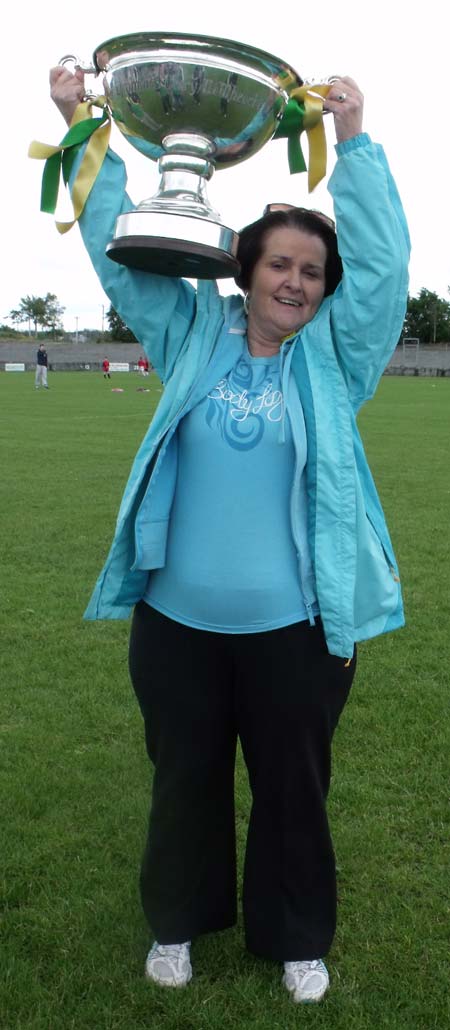 Breege Scott, Scoil Chatriona, hoists the Lory Meagher high.