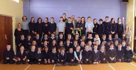 Cian McEniff and Megan McGee, Saint Macartan's winning captains hold the Lory Meagher cup.