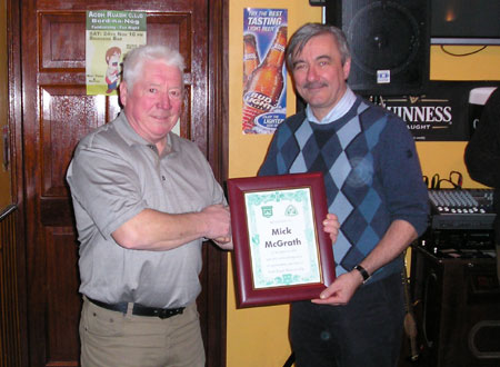 Jim Kane, Chairman, Bord na nÓg, presents a framed certificate in acknowledgement of sponsorship and fundraising work to Mick McGrath, Proprietor of the Bridgend pub, Ballyshannon.