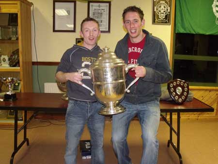 Peter Horan and Michael Fennelly holding the Bob O'Keefe cup.