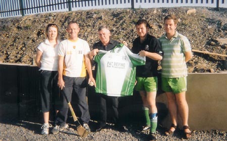 Mr. Pat Devine presenting a set of minor jerseys to the Aodh Ruadh minor huling team. Pictured is Emma Gaughan (hurling secretary), Thomas Gallagher, Pat Devine (Devine's transport), Kevin Loughlin (Minor team manager) and Dennis Doherty (hurling Chairman).