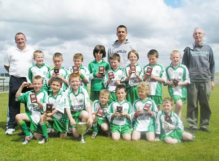 The victorious Aodh Ruadh's 'A' team and mentors after triumph over Bundoran in the Mick Shannon final last Saturday..