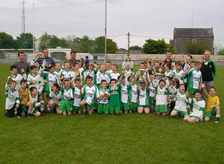 The 'A' and 'B' teams of Aodh Ruadh celebrate after victories in their respective finals of the Michael Shannon under 10 tournament in Ballyshannon last Saturday.