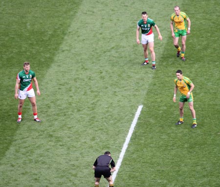 Action from the All-Ireland Senior Football Championship final between Donegal and Mayo.