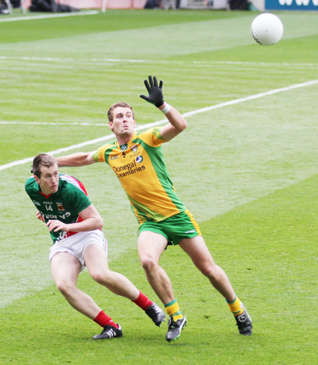 Action from the All-Ireland Senior Football Championship final between Donegal and Mayo.