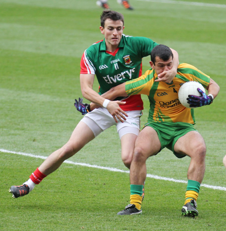 Action from the All-Ireland Senior Football Championship final between Donegal and Mayo.