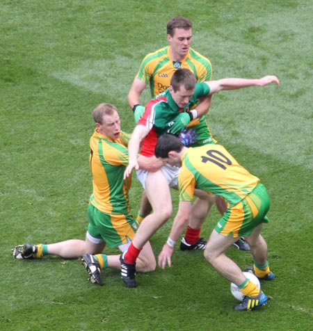 Action from the All-Ireland Senior Football Championship final between Donegal and Mayo.