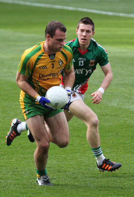 Action from the All-Ireland Senior Football Championship final between Donegal and Mayo.