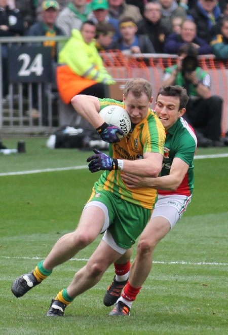 Action from the All-Ireland Senior Football Championship final between Donegal and Mayo.