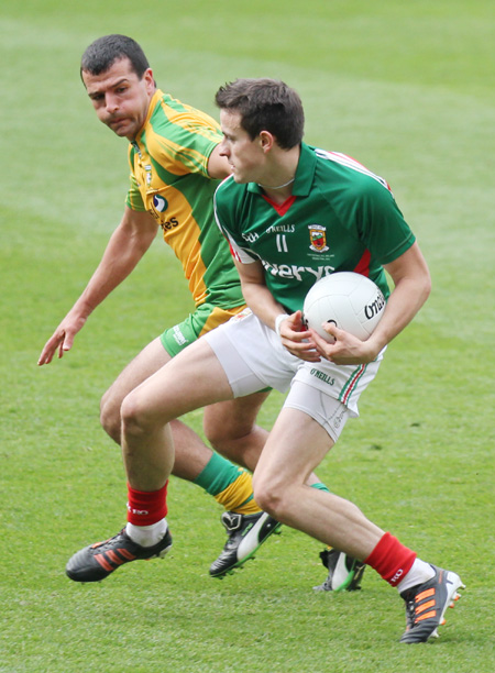 Action from the All-Ireland Senior Football Championship final between Donegal and Mayo.