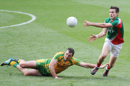 Action from the All-Ireland Senior Football Championship final between Donegal and Mayo.