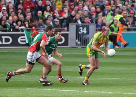 Action from the All-Ireland Senior Football Championship final between Donegal and Mayo.