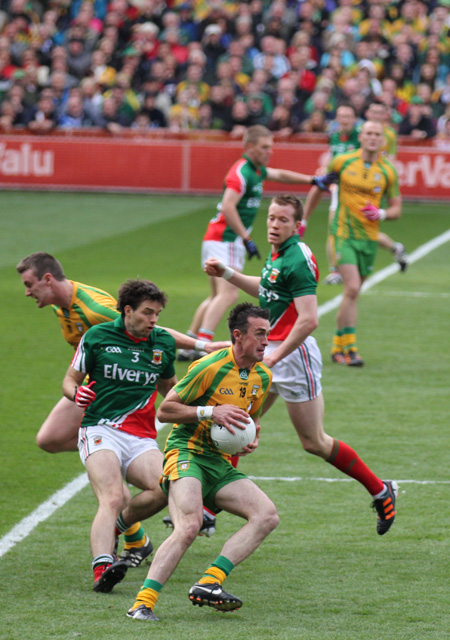 Action from the All-Ireland Senior Football Championship final between Donegal and Mayo.