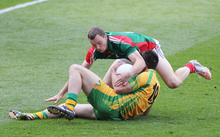 Action from the All-Ireland Senior Football Championship final between Donegal and Mayo.