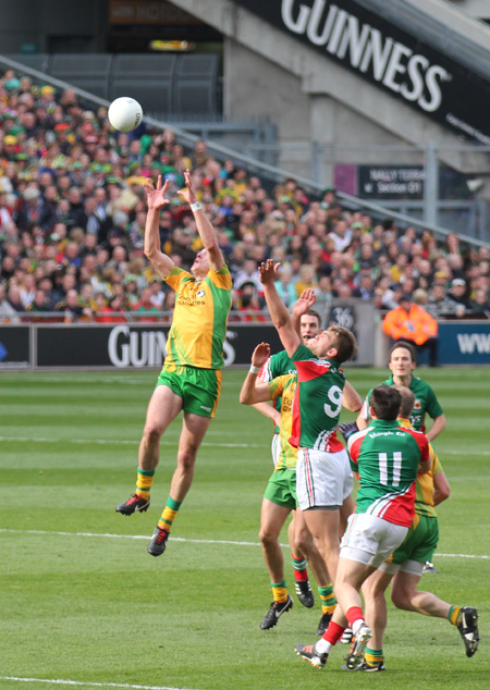 Action from the All-Ireland Senior Football Championship final between Donegal and Mayo.