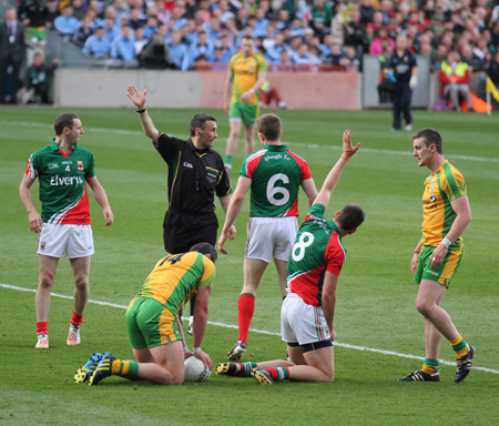 Action from the All-Ireland Senior Football Championship final between Donegal and Mayo.