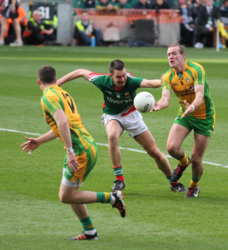 Action from the All-Ireland Senior Football Championship final between Donegal and Mayo.