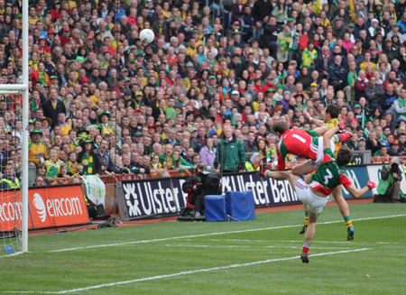 Action from the All-Ireland Senior Football Championship final between Donegal and Mayo.