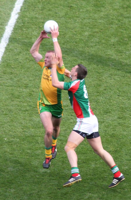 Action from the All-Ireland Senior Football Championship final between Donegal and Mayo.