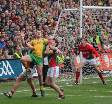 Action from the All-Ireland Senior Football Championship final between Donegal and Mayo.