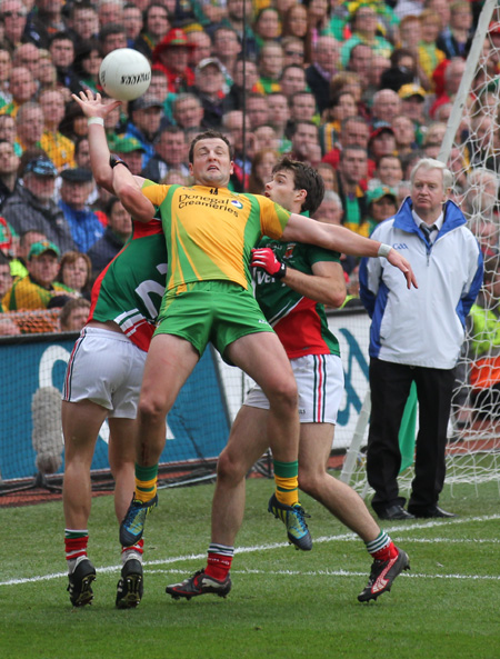 Action from the All-Ireland Senior Football Championship final between Donegal and Mayo.