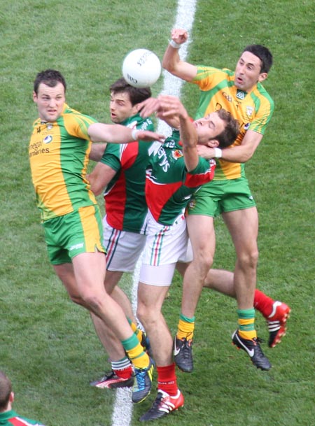 Action from the All-Ireland Senior Football Championship final between Donegal and Mayo.