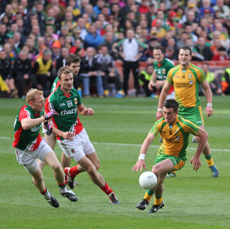 Action from the All-Ireland Senior Football Championship final between Donegal and Mayo.