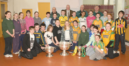 Senior pupils from Rockfield National School, Ballyshannon pictured with the Sam Maguire, Tom Markham (All-Ireland minor football championship) and McKenna cups when they visited their school last Friday.