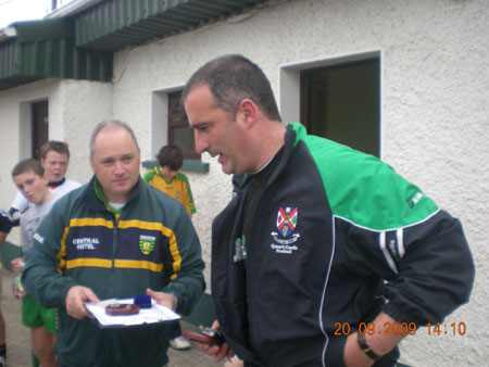 John Rooney addressing the crowd with Eddie Lynch in the background.