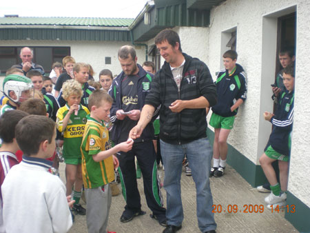 Michael Ayres, under 10 joint manager, presenting Ryan Ayres, third in the under 10 section with his medal.