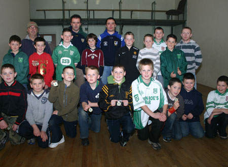 Alan Kerins, Galway senior hurling star, presenting Aodh Ruadh under 12 hurlers with their county medals after the M. Donnelly interprovincial matches between Ulster and Connacht in Ballybofey on Saturday, 20th October.