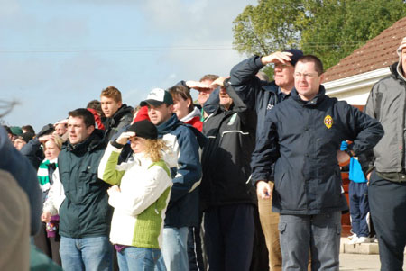 The Aodh Ruadh faithful watch anxiously.