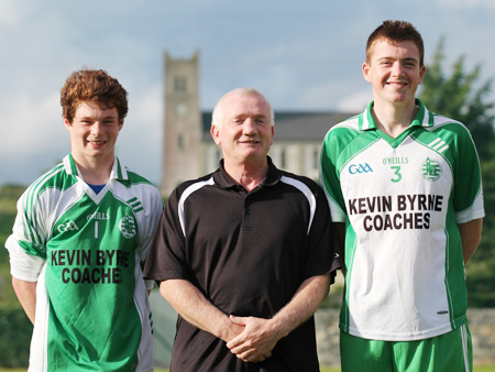 Kevin Byrne, centre, who sponsored a new set of jerseys for the under 16 team. He is pictured here with Aodh Ruadh defensive rocks Daniel Kelly and Eamon McGrath.